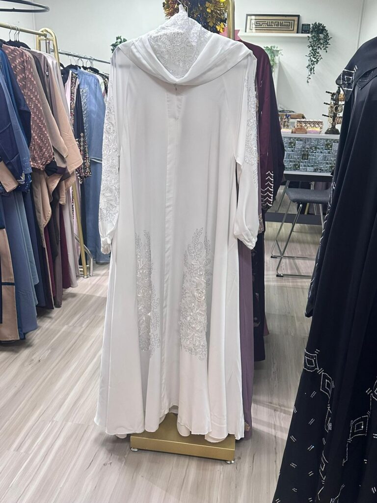 White abayas and crisp sneakers are a Singaporean staple